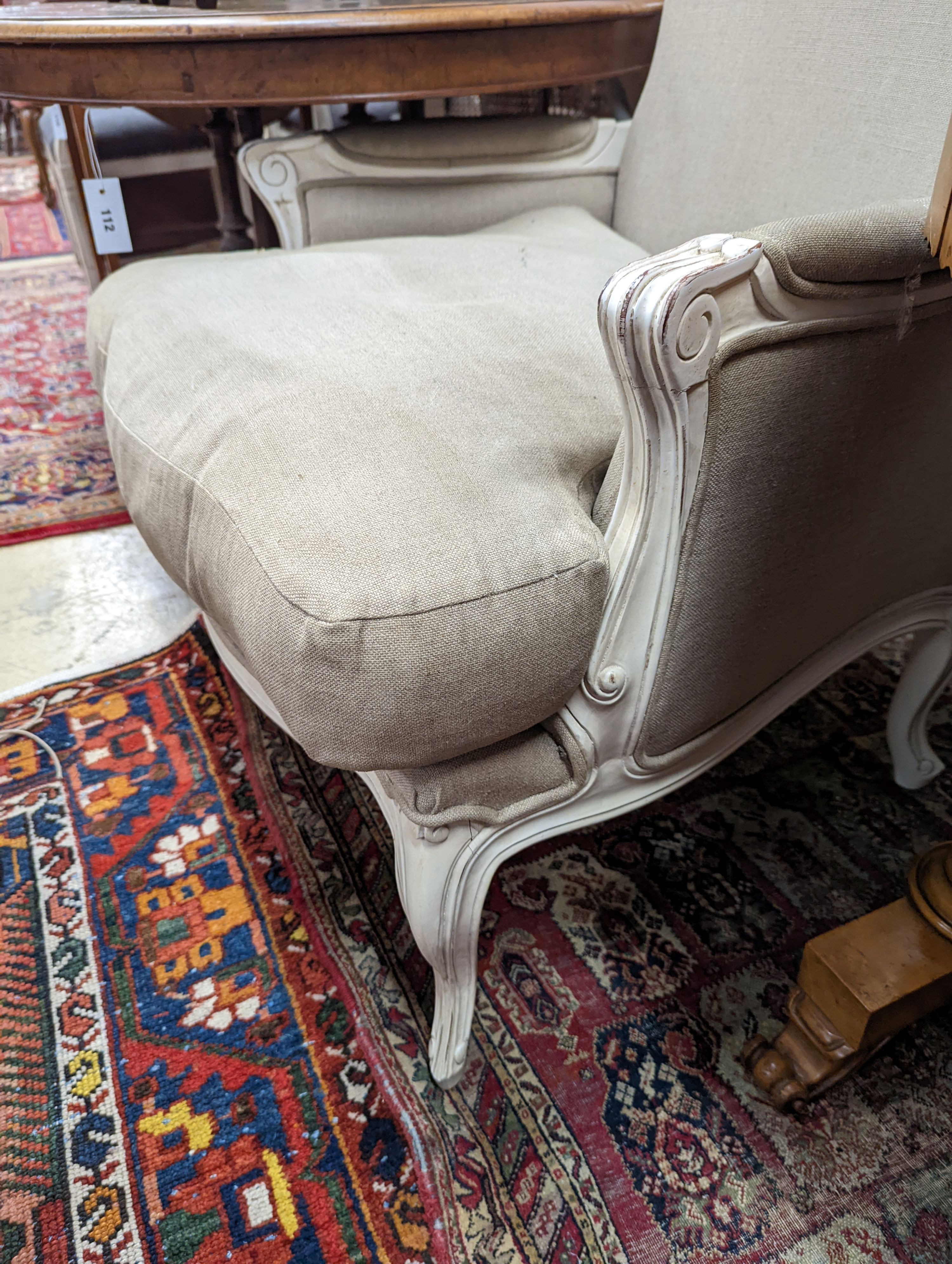 A French painted upholstered armchair, width 71cm, depth 70cm, height 94cm